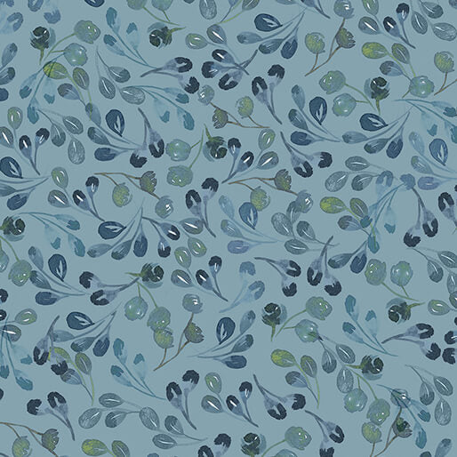 Fabric pattern of blue and green leaves on a blue background. (Sewing Bee Studio)