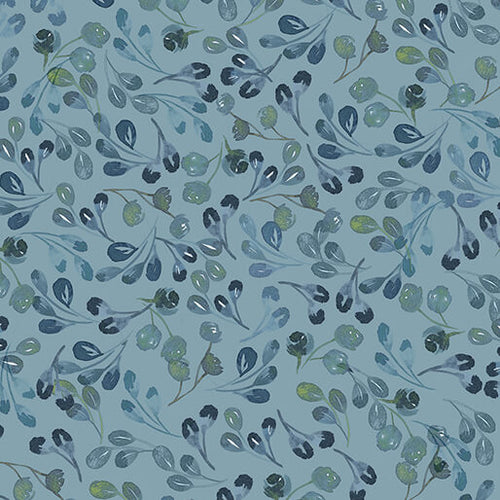 Fabric pattern of blue and green leaves on a blue background. (Sewing Bee Studio)