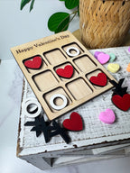 Wooden puzzle with heart and star shapes on a rustic wooden box, with 'Happy Valentine's Day' text. Sewing Bee Studio 