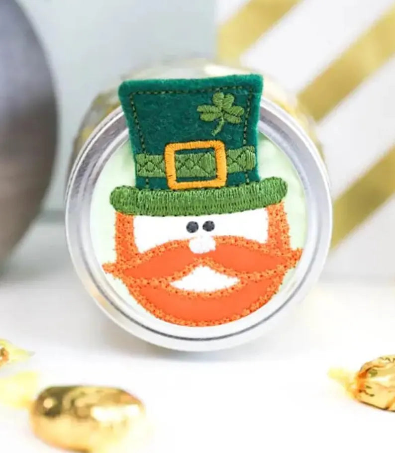 Leprechaun-themed lid on a container with gold accents