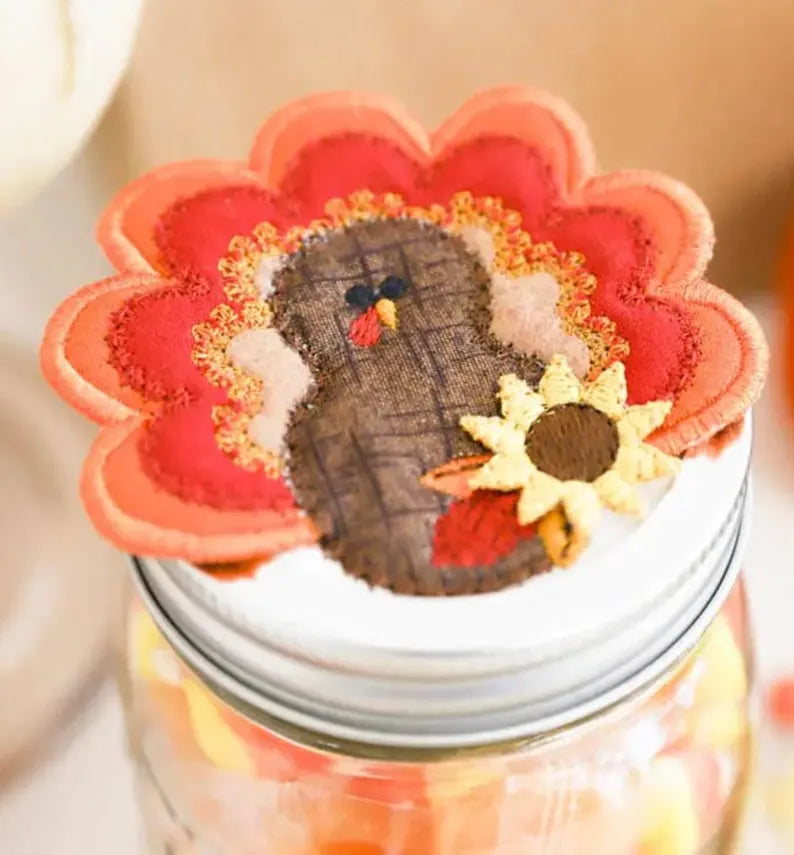Decorative turkey on a floral-patterned lid of a jar with a blurred background