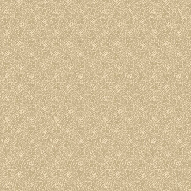 A beige fabric with a floral lace pattern design. Sold by Sewing Bee Studio.