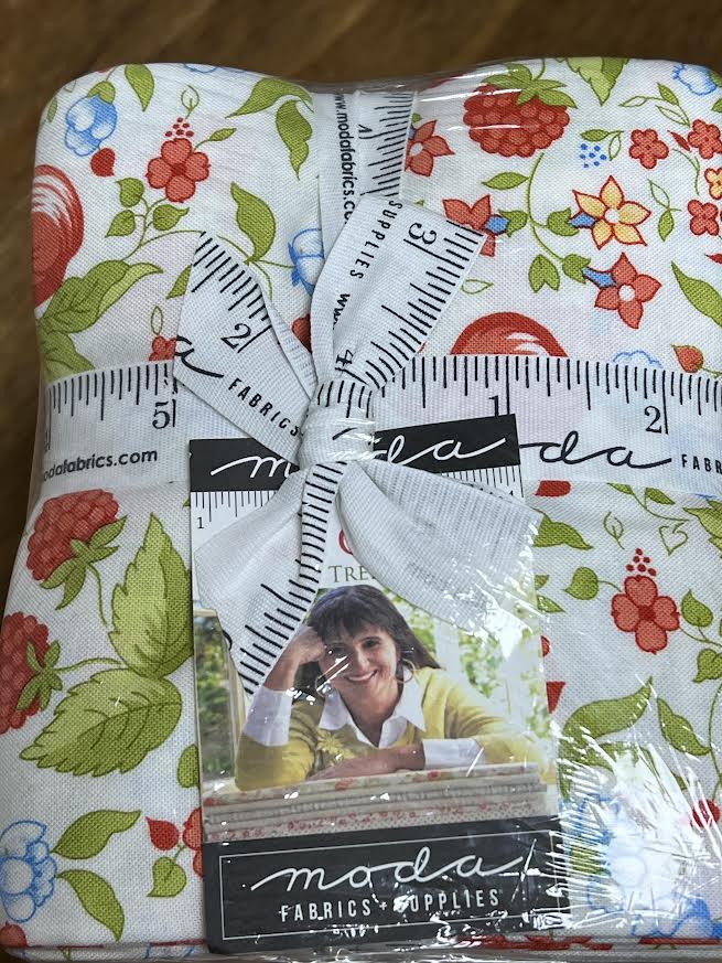 Packaged floral fabric with Moda Fabrics branding and designer label for product sold by Sewing Bee Studio.