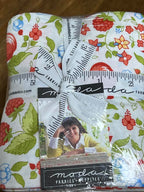 Packaged floral fabric with Moda Fabrics branding and designer label for product sold by Sewing Bee Studio.