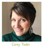 Designer, Corey Yoder wearing a green turtleneck with a neutral background. Fat quarter bundle of her fabric collection is sold by Sewing Bee Studio.