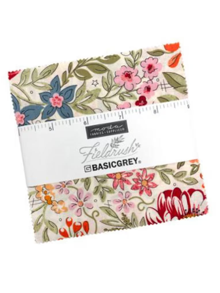 Floral-patterned fabric bundle with a ruler and 'BasicGrey' branding on a white background