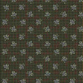 Fabric from the Midnight Lace collection with blue floral patterns on a green checkered background. Sold by Sewing Bee Studio.